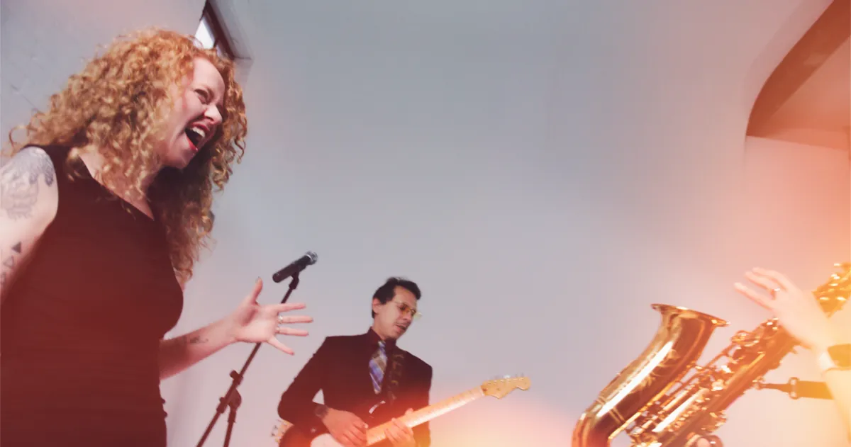 Tiny Pockets band performing together
